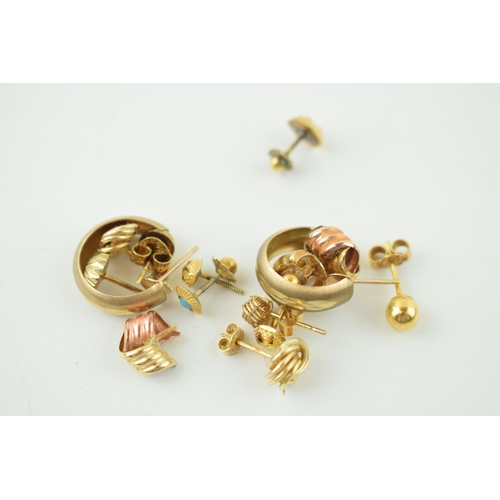 619 - A mixed collection of 9ct yellow gold earrings and studs. 5.5 grams.