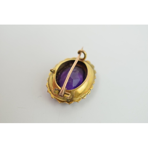 624 - 9ct gold brooch, central amethyst surrounded by pearls, tests as 9ct gold, 4.7g.