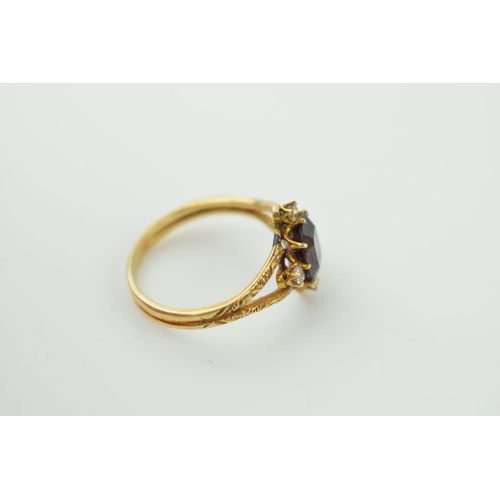 625 - 9ct gold ring, textured shoulders, set garnet and diamonds, tests as 9ct, 3.8g, size R/S.