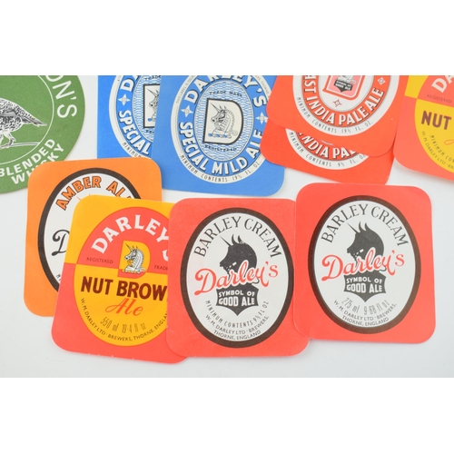 367 - A collection of new old stock beer bottle labels to include 'Darley's' 'Nut Brown Ale', 'Barley Crea... 