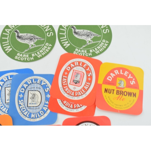 367 - A collection of new old stock beer bottle labels to include 'Darley's' 'Nut Brown Ale', 'Barley Crea... 