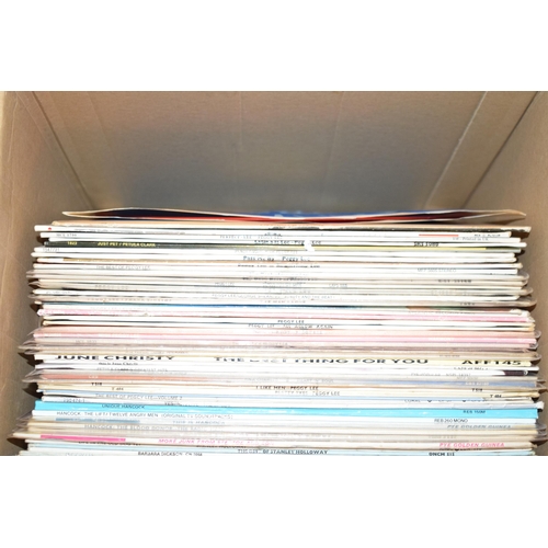 368 - A large collection of vinyl album records including Tammy wynette, Peggy Lee, Dolly Parton etc in th... 