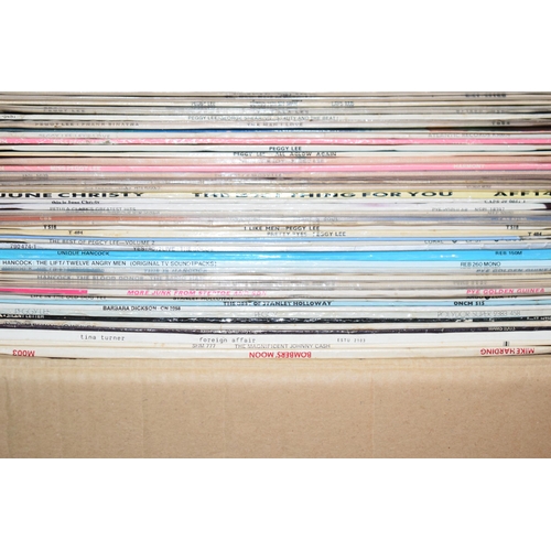 368 - A large collection of vinyl album records including Tammy wynette, Peggy Lee, Dolly Parton etc in th... 