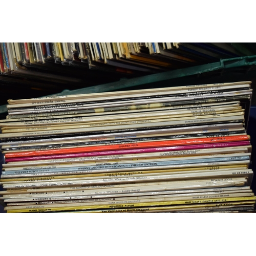 368 - A large collection of vinyl album records including Tammy wynette, Peggy Lee, Dolly Parton etc in th... 