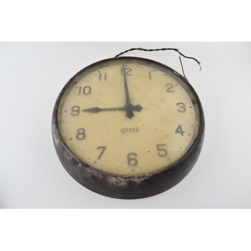 373 - A Gents' of Leicester factory style wall clock. Off white circular dial. Arabic numerals. Bakelite c... 