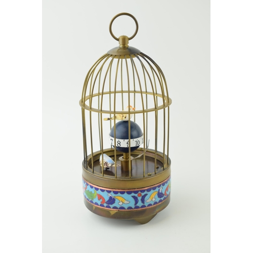 374 - Reproduction brass coloured bird cage clock, cloisonne decoration, working order, 19.5cm tall.