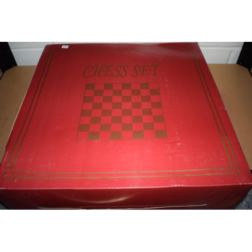 379 - A Modern Ornate Chess Set and Board the chess pieces depicting Napoleonic soldiers in original box