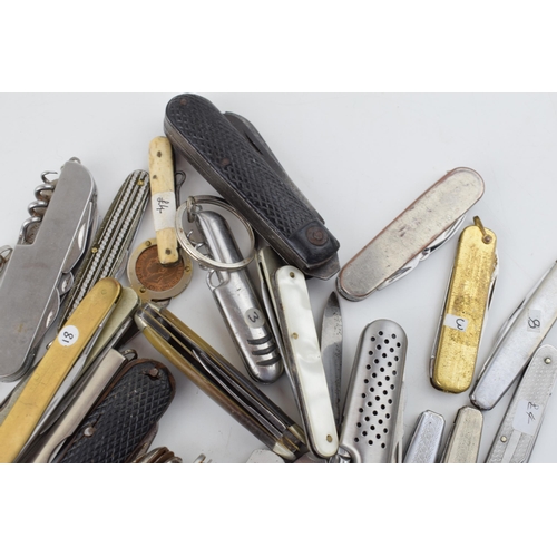 381 - A large quantity of vintage pocket knives to include advertising knives, Sheffield knives, military ... 