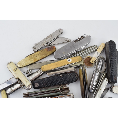 381 - A large quantity of vintage pocket knives to include advertising knives, Sheffield knives, military ... 