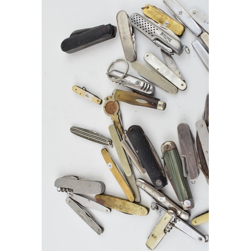 381 - A large quantity of vintage pocket knives to include advertising knives, Sheffield knives, military ... 