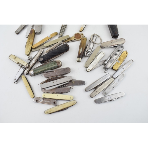 381 - A large quantity of vintage pocket knives to include advertising knives, Sheffield knives, military ... 