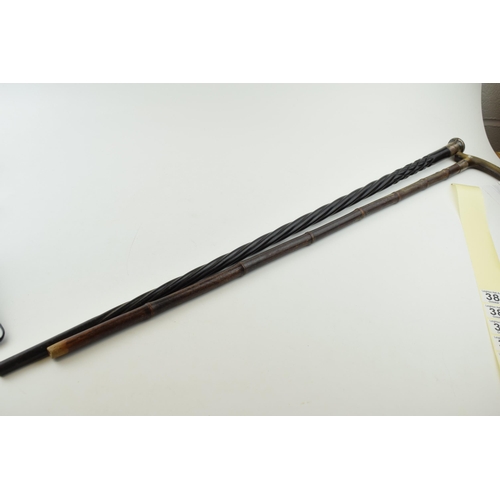 382 - A silver topped ebonised cane, C&Co London together with a bamboo cane with horn handle and silver a... 