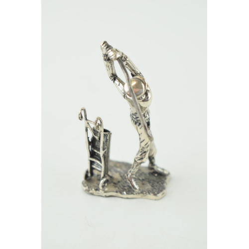 392 - Miniature silver figure of a golfer, with golf bag, 32.6g, 6cm tall, marks to underside of base.