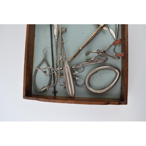 395 - A collection of 20th century vintage vetinary dentist equipment to include tongues, mouth lasts and ... 