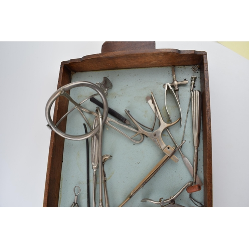 395 - A collection of 20th century vintage vetinary dentist equipment to include tongues, mouth lasts and ... 