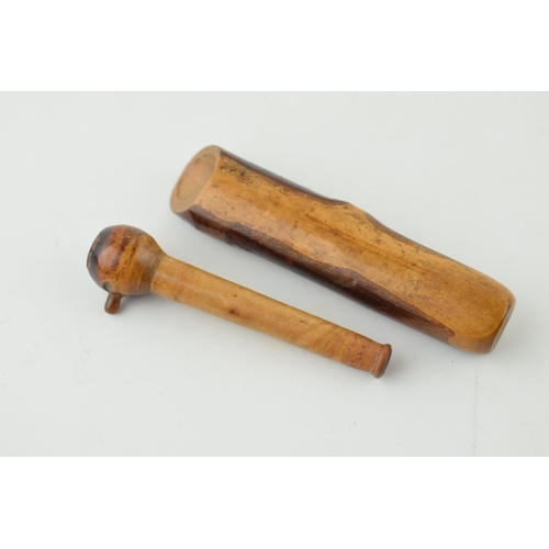 397 - Treen novelty cheroot holder, with carved face, in wooden sleeve, 9cm long.