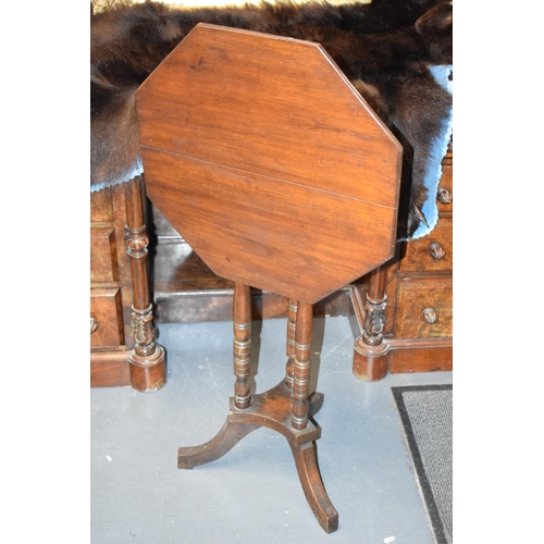 404 - 1930s mahogany tilt-top pedestal table, 74cm tall, 51cm wide.