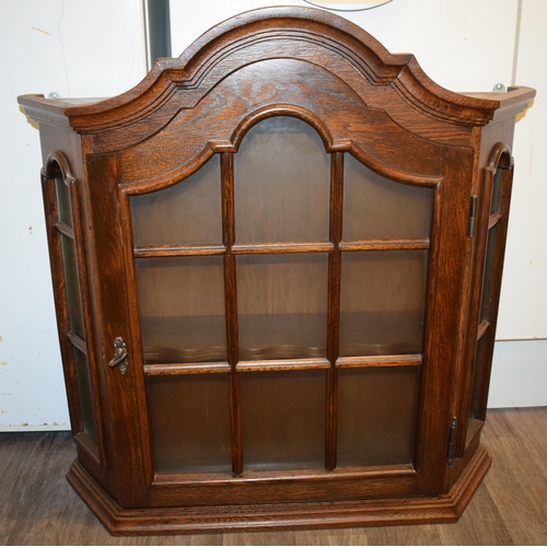 406 - Mid to late 20th century wall hanging wooden collectors cabinet, glazed door, shaped top, 67cm wide,... 