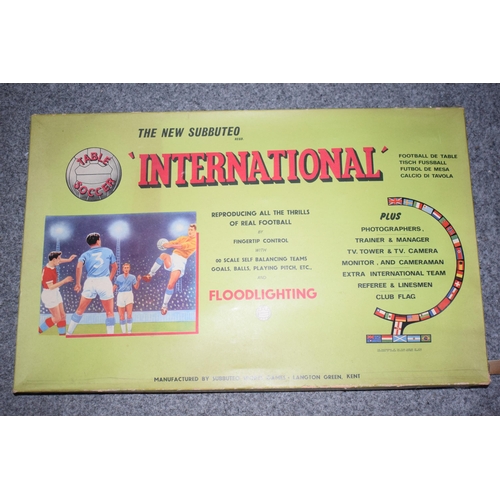 416 - A Subbuteo Table Soccer 'International' Set. To include boxed set that appears to be complete togeth... 