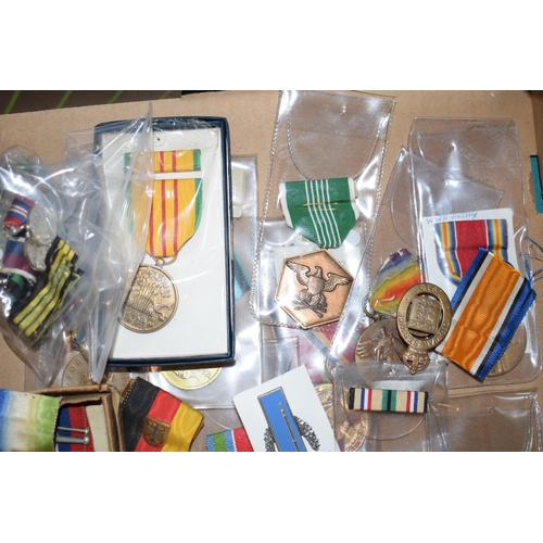 434 - A large collection of military medals to include United States, British and UN medals together with ... 