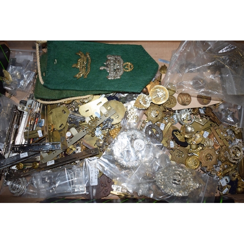 436 - A large collection of military cap badges, WWI and WWII era mainly British, United States and German... 