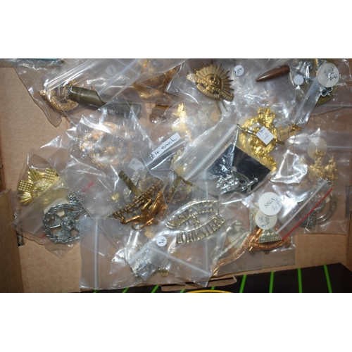 437 - A large collection of military cap badges, WWI and WWII era mainly British Army. (Qty)