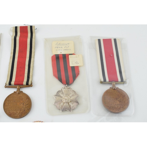 449 - A collection of medals to include WWI Victory Medal, silver Belgium Medal for Civic Merit, Special C... 