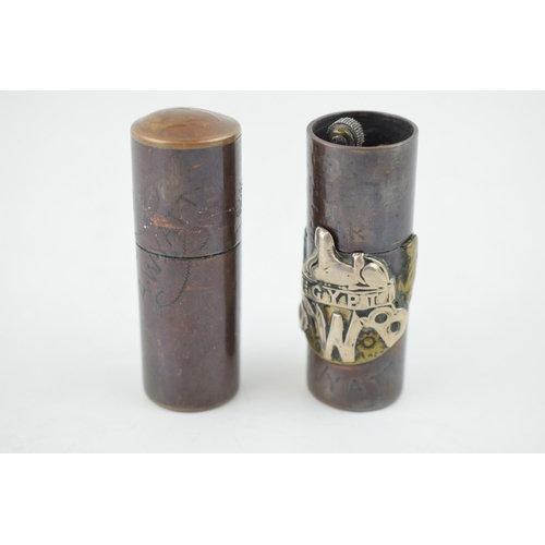 452 - A pair of World War Two trench art cigarette lighters, one with 'Egypt SWB Wyatt' and 'Xmas 44', (2)... 