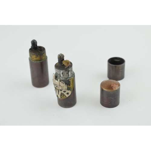 452 - A pair of World War Two trench art cigarette lighters, one with 'Egypt SWB Wyatt' and 'Xmas 44', (2)... 