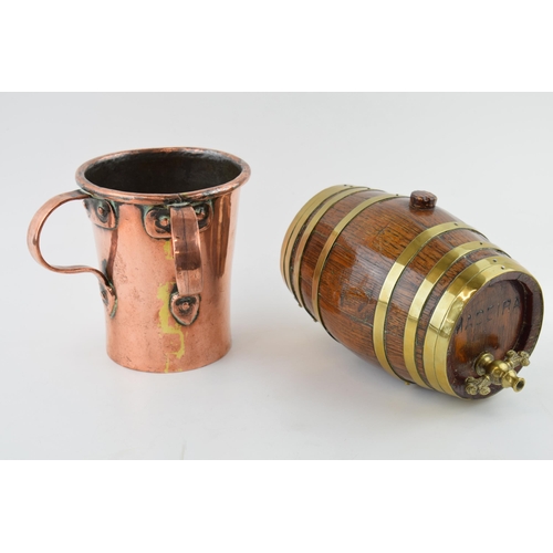 457 - A Victorian two handled copper drinking or cooking vessel, riveted handles, with an oak and brass co... 