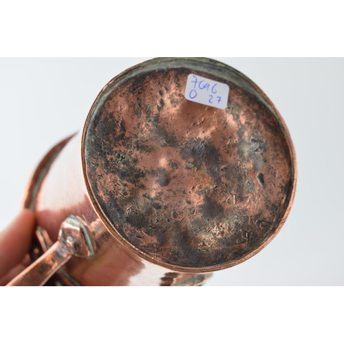 457 - A Victorian two handled copper drinking or cooking vessel, riveted handles, with an oak and brass co... 