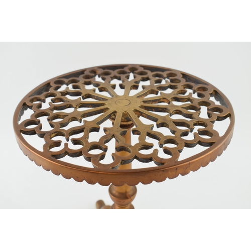 462 - Antique brass fireside trivet, similar to a tripod table, heavy, 27cm tall.