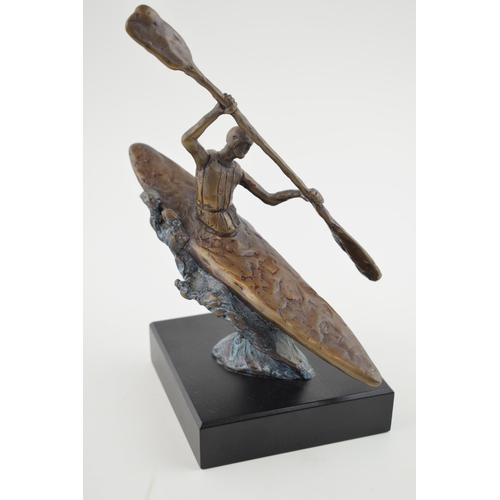 466 - Contemporary bronzed cast sculpture of a canoeing figure, mounted on marble base, 'Kimb', 21cm tall.