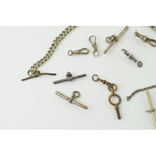 467 - A collection of albert chain / watch chain items to include silver T bars and plated examples, with ... 