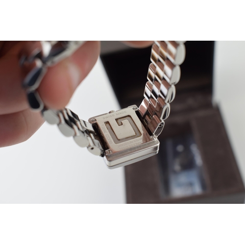 472 - A ladie's Gucci G 3600L bracelet watch. Swiss quartz movement 
A gentleman`s Dunhill Facet bracelet ... 