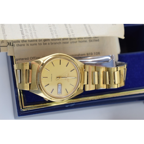 475 - A Seiko 5 day date automatic movement gentleman's gold plated wristwatch. Applied baton markers with... 