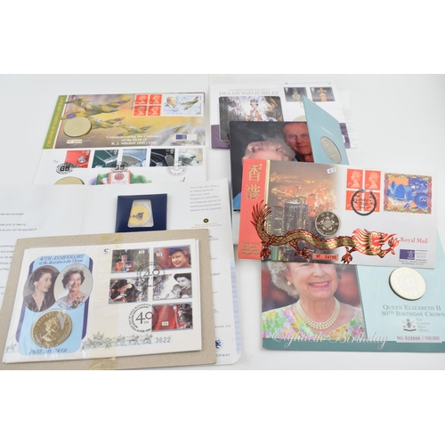 499 - A collection of carded Royal Mint commemorative coins with other mints to include the London Mint su... 