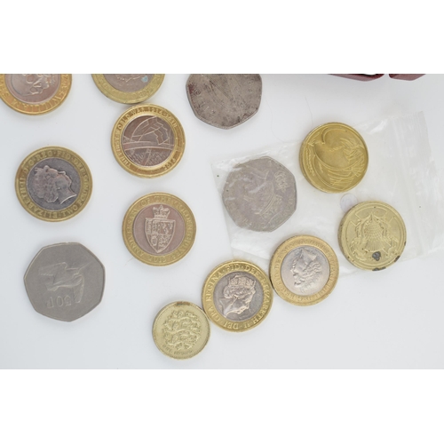 501 - A collection of UK currency to include 10 current £2 coins with differing obverses with a collection... 