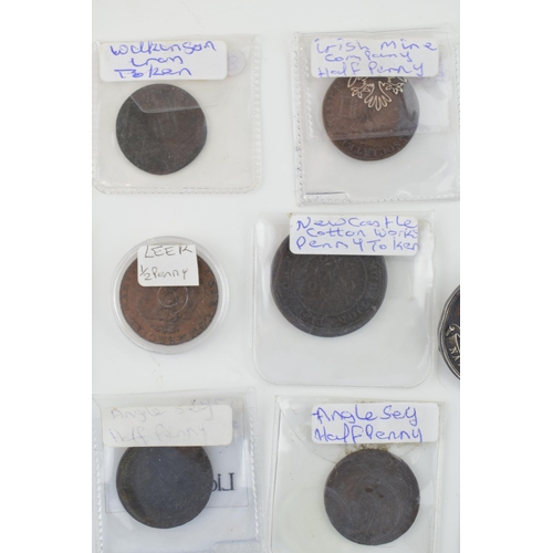 503 - A collection of antique localised coins and tokens to include a Leek half penny, a Newcastle Cotton ... 