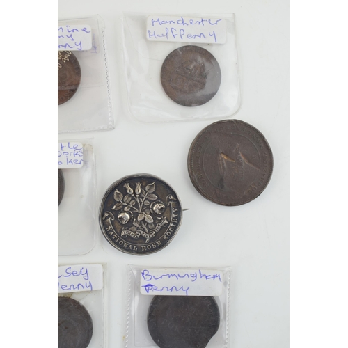 503 - A collection of antique localised coins and tokens to include a Leek half penny, a Newcastle Cotton ... 