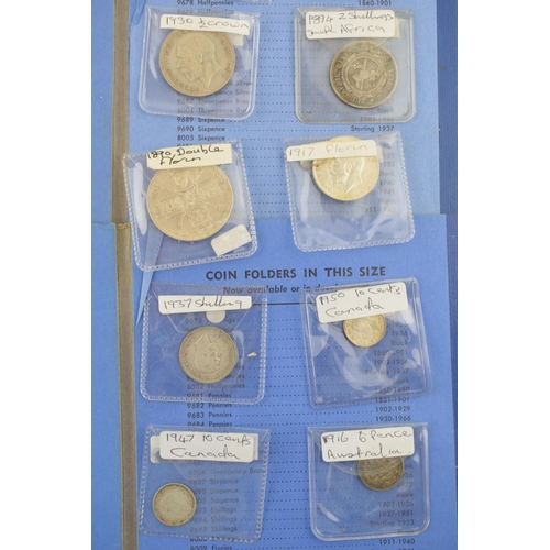 504 - A collection of silver coins to include an 1890 silver double florin, a 1917 florin and others with ... 