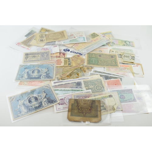 505 - A large and varied collection of world / foreign bank notes to include a UK £1 note, and other count... 