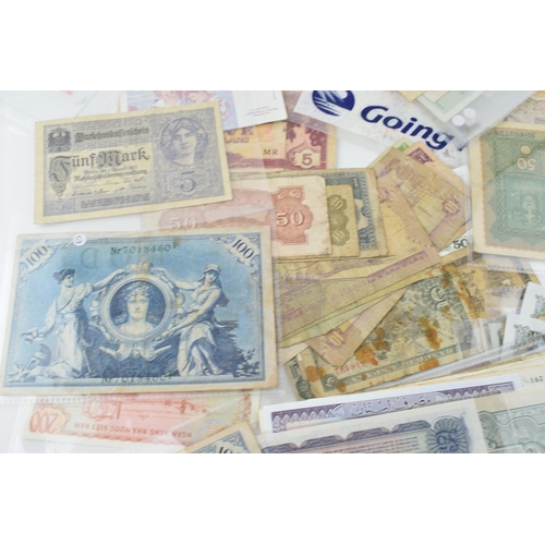 505 - A large and varied collection of world / foreign bank notes to include a UK £1 note, and other count... 