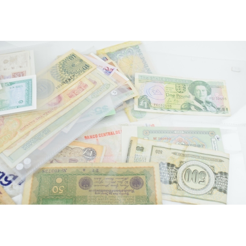 505 - A large and varied collection of world / foreign bank notes to include a UK £1 note, and other count... 