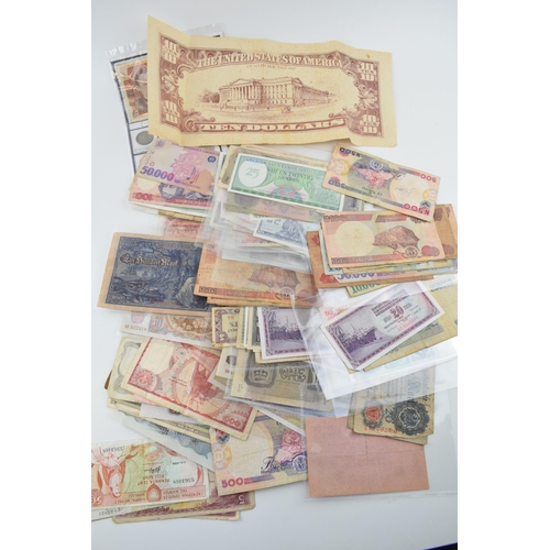 507 - A large and varied collection of world / foreign bank notes to include Germany, Romania, Suriname, N... 