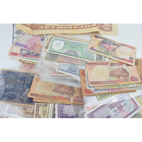 507 - A large and varied collection of world / foreign bank notes to include Germany, Romania, Suriname, N... 