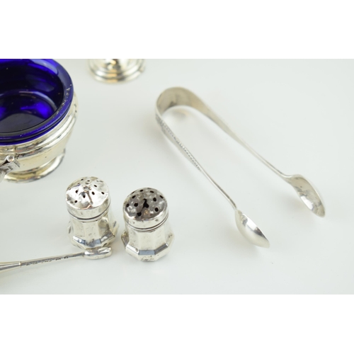 526 - Hallmarked silver to include a pair of tongs, condiments and a dish with glass liner, silver weight ... 