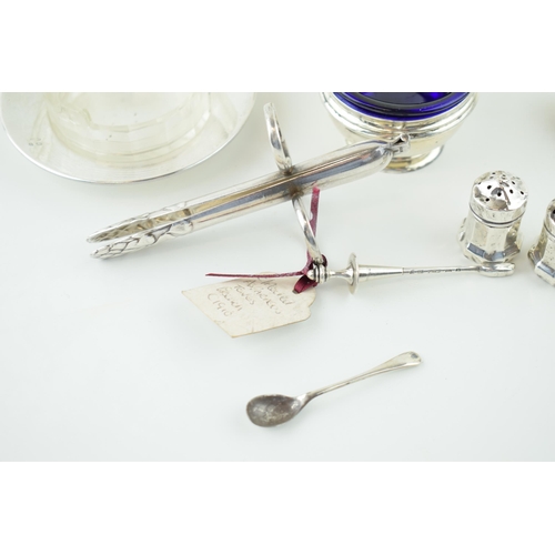 526 - Hallmarked silver to include a pair of tongs, condiments and a dish with glass liner, silver weight ... 