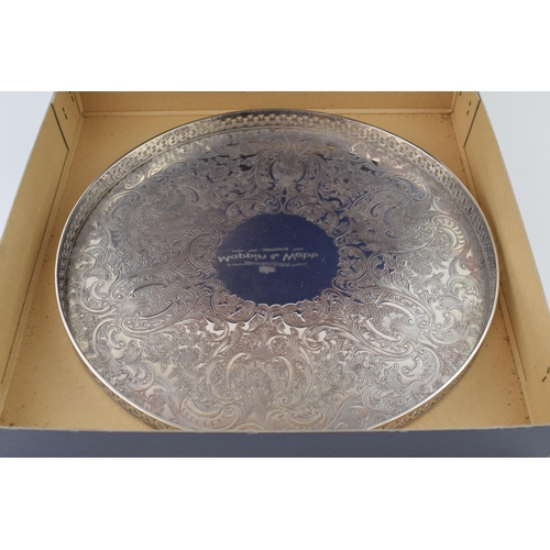 532 - Boxed silver plated Mappin and Webb galliered circular tray, 29.5cm wide.