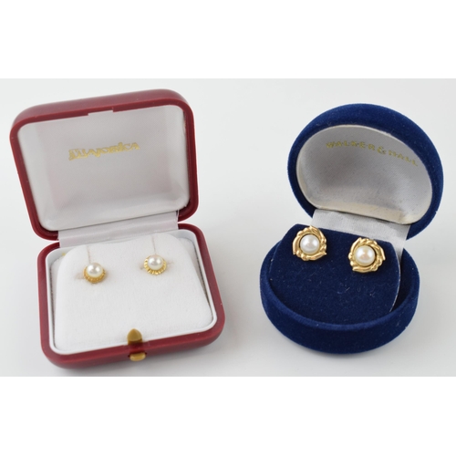 620 - A pair of cased 14ct yellow gold pearl studs (gross weight 1.1 grams) together with a pair of cased ... 